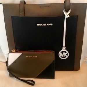 Women's Michael Kors Leather tote and wristlet , new , never used.